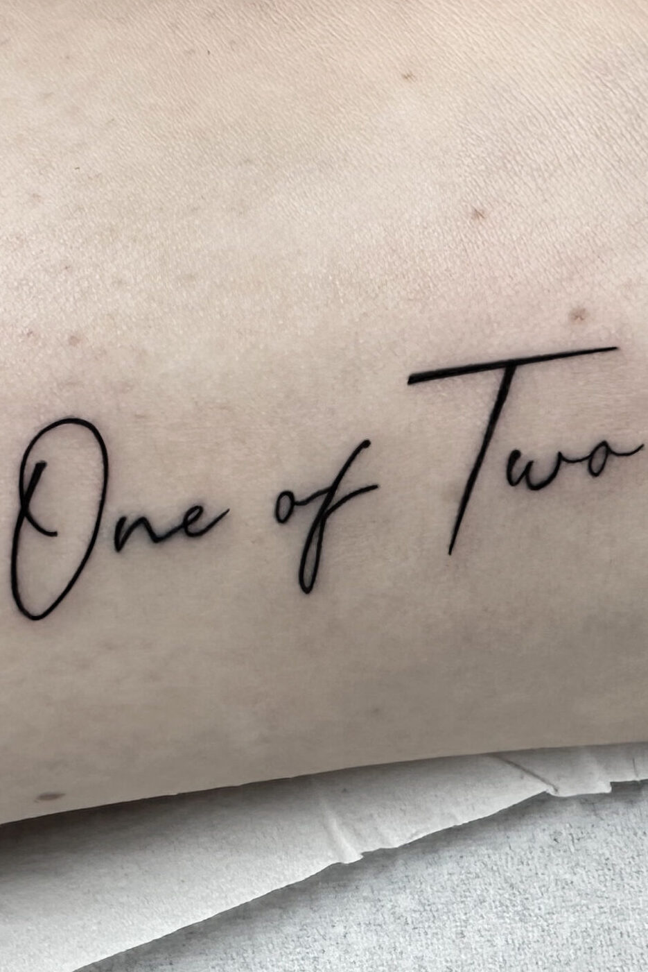 Best friends tattoo ‘One of Two’ by tattoo artist Marcus Kingsland at Markings Tattoos in Beverley, East Riding of Yorkshire.