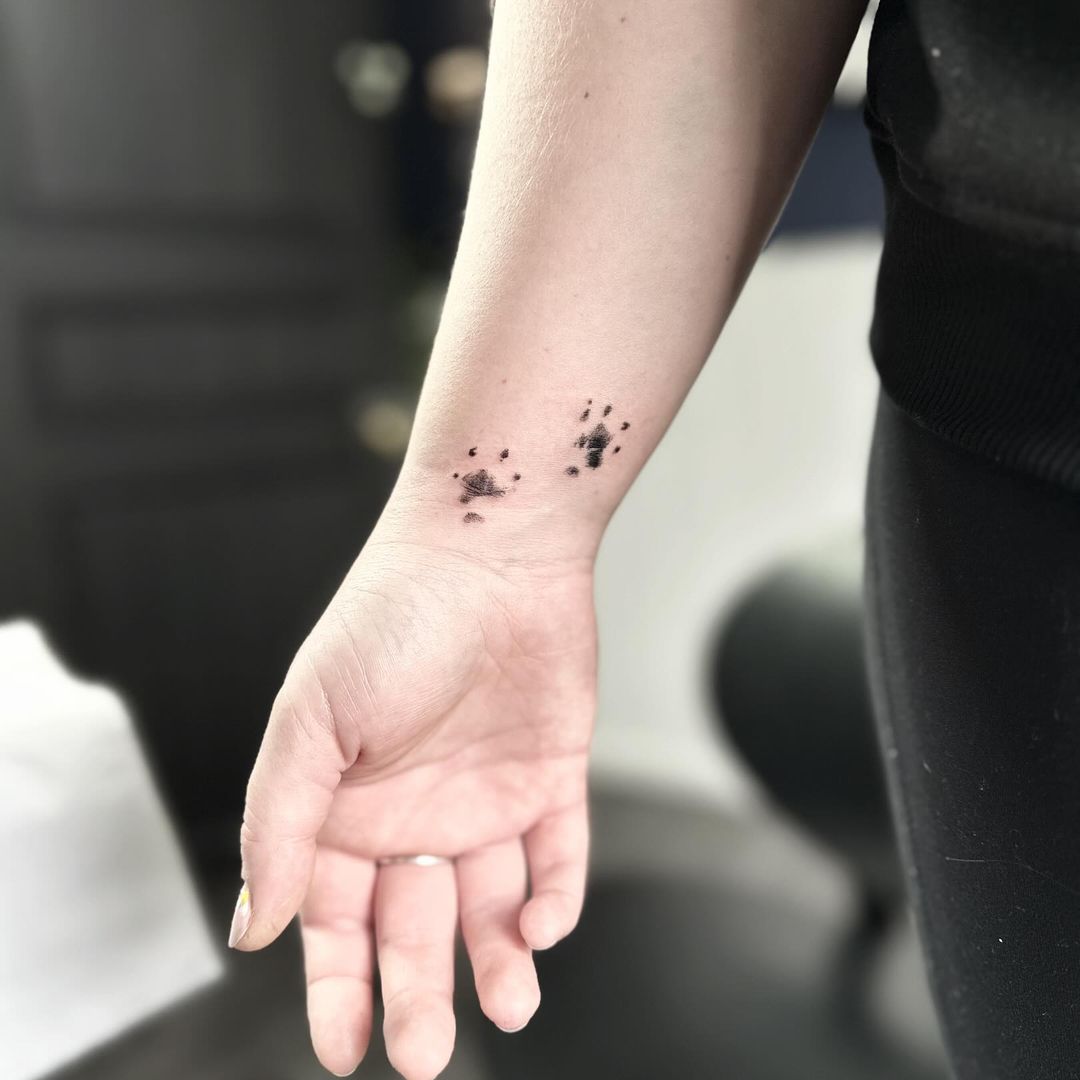 Guinea pig paw prints tattoo by artist Marcus Kingsland at Markings Tattoos in Beverley, East Riding of Yorkshire.