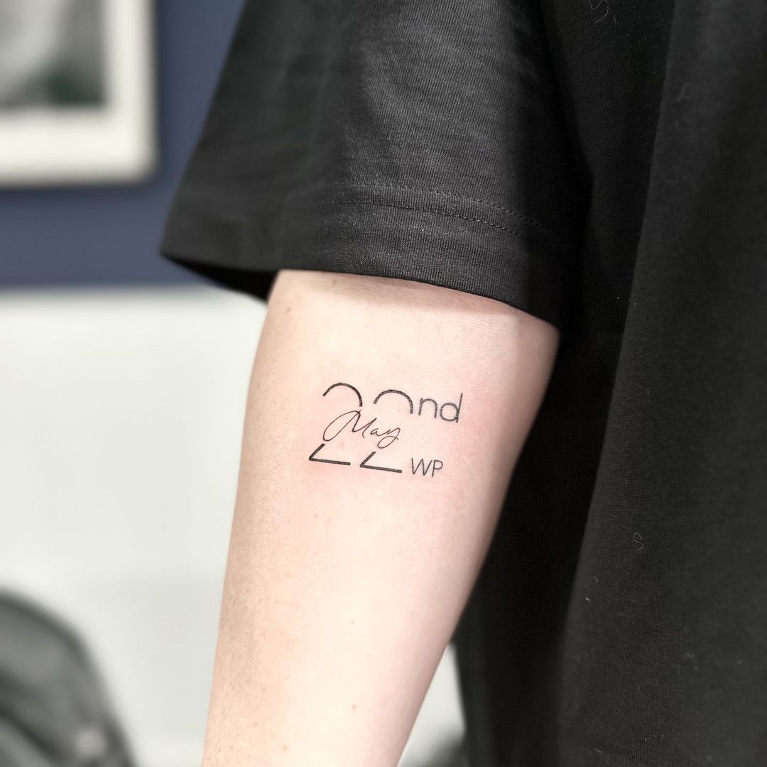 New baby birth date tattoo by artist Marcus Kingsland at Markings Tattoos in Beverley, East Riding of Yorkshire.