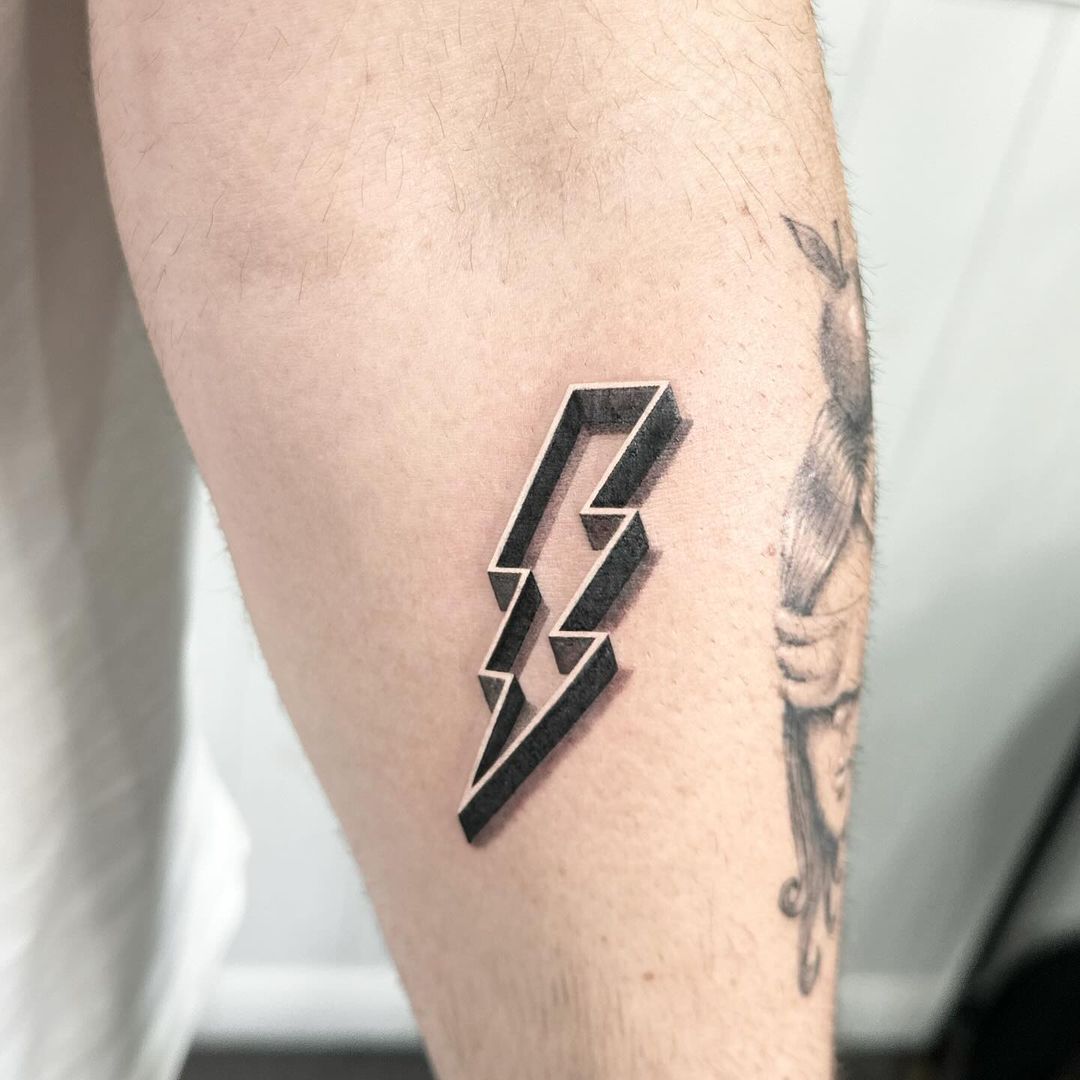 3D lightning bolt tattoo by artist Marcus Kingsland at Markings Tattoos in Beverley, East Riding of Yorkshire.