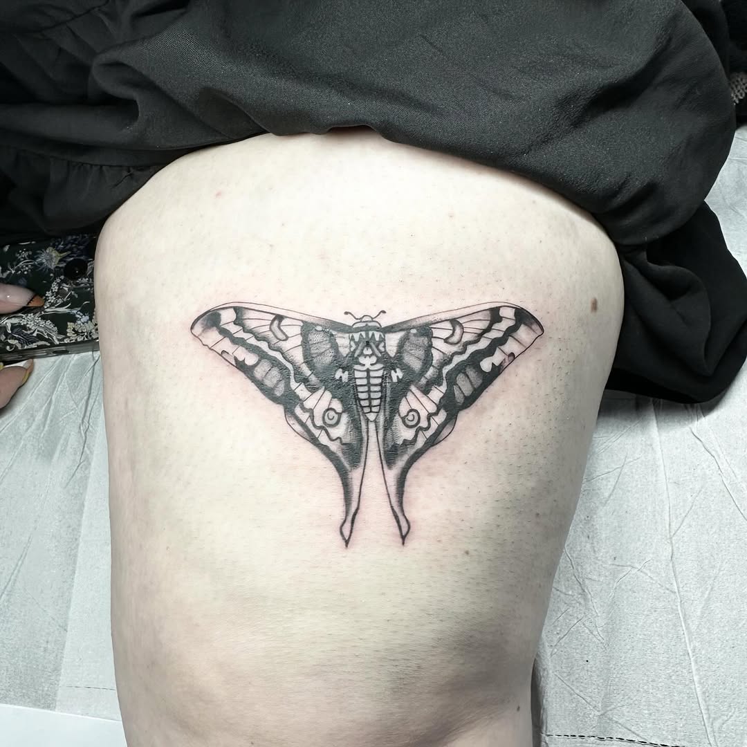 Death moth tattoo by artist Marcus Kingsland at Markings Tattoos in Beverley, East Riding of Yorkshire.