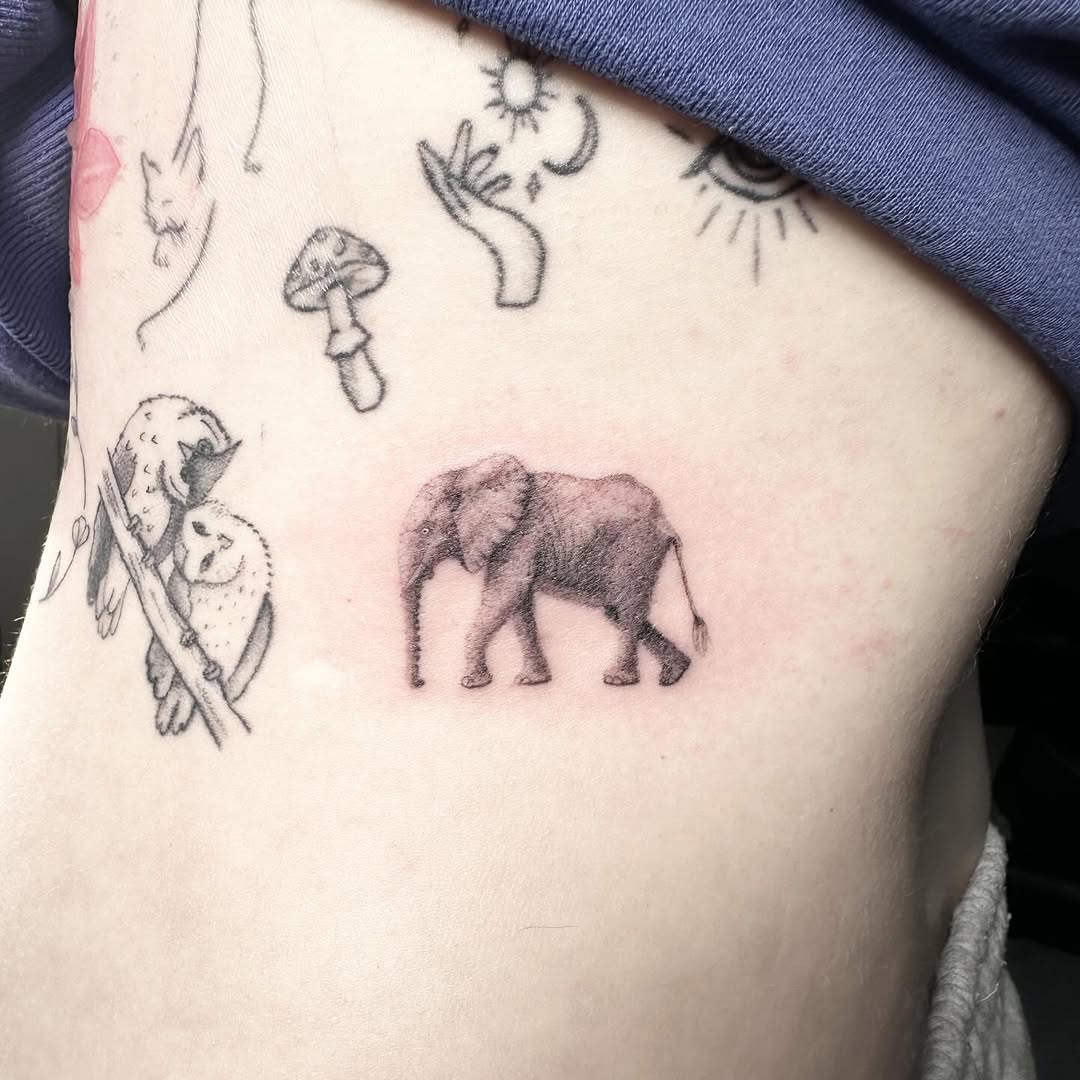 Miniature elephant tattoo by artist Marcus Kingsland at Markings Tattoos in Beverley, East Riding of Yorkshire.